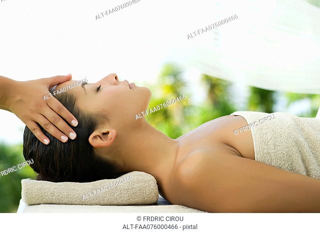 Woman getting a massage at spa