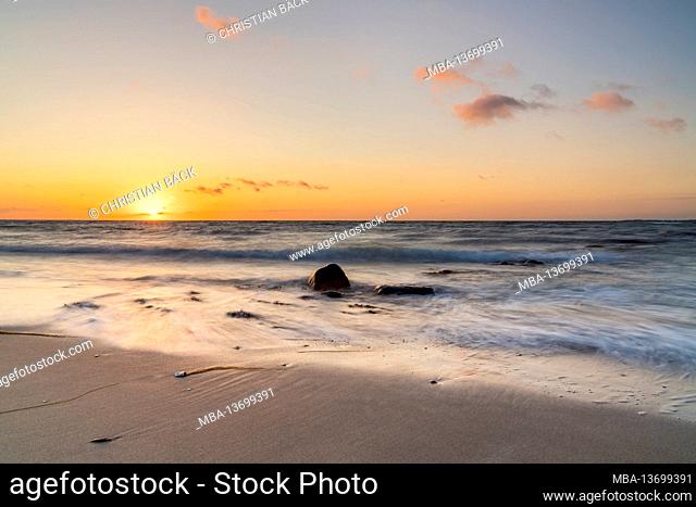 Sunset on the beach on the Graswarder peninsula near Heiligenhafen, Schleswig-Holstein, Germany