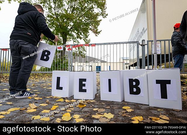 02 November 2023, Saxony-Anhalt, Eisleben: ""Stay"" is written on cardboard boxes in front of the factory gate of the toy and furniture manufacturer Haba in...