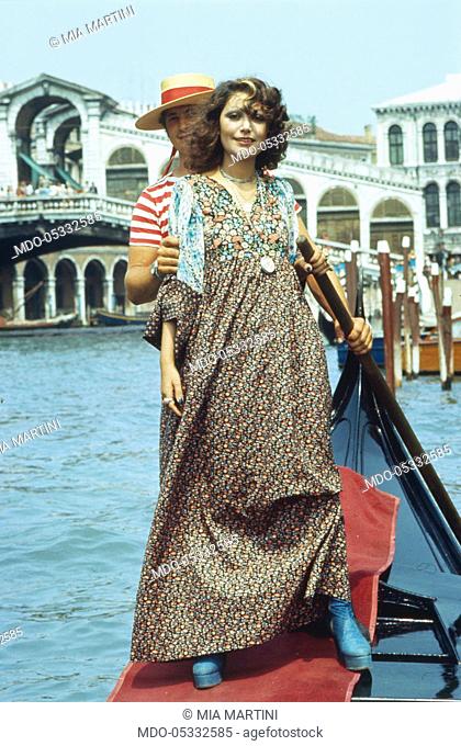 The singer Mia Martini (Domenica Rita Adriana Bertè) on a gondola. Venice, Italy. 1973