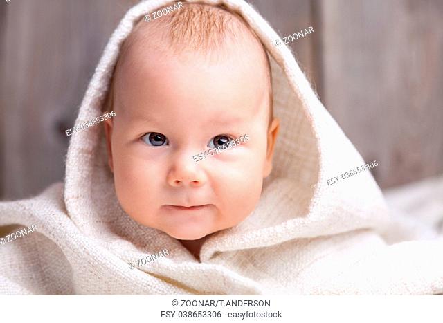 Beautiful newborn baby wrapped in a blanket