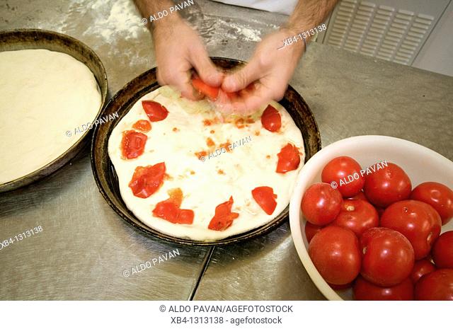 Italy, Apulia, Altamura, Antica Casa Digesù, preparation of 'focaccia', type of pizza