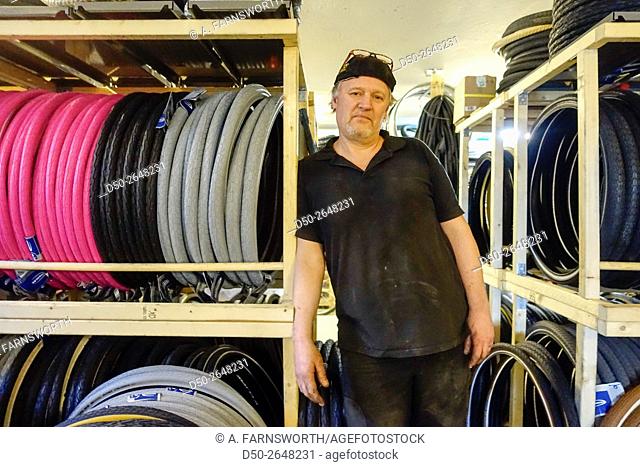 STOCKHOLM, SWEDEN Bicycle repairman in suburb of Fruängen