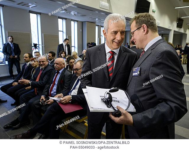 Saxony's Premier Stanislaw Tillich (CDU, L) talks to the president of the Meetingpoint Music Messiaen, Frank Seibel (R) during the opening ceremony of the...