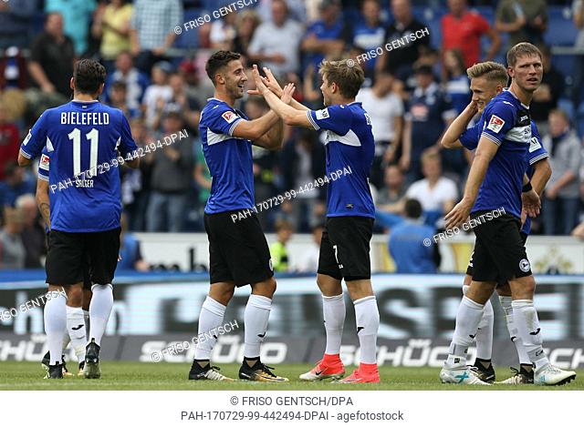 Bielefeld's goal scorer Andraz Sporar (C, L) celebrates his 2-1 goal together with Patrick Weihrauch (C, R) during the German 2
