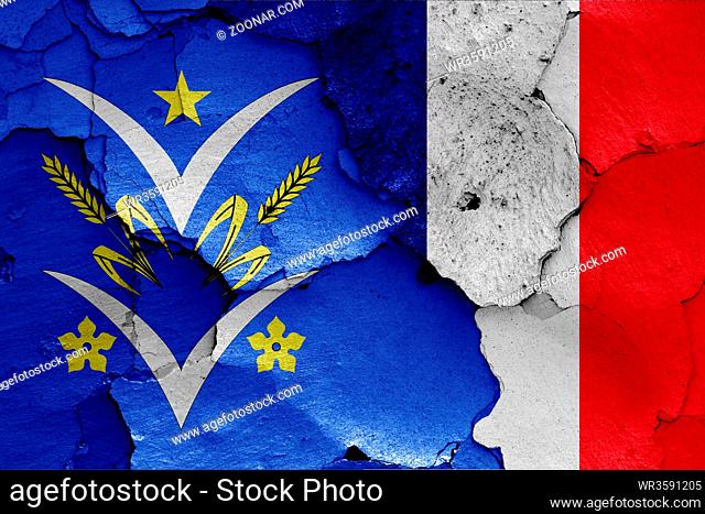 flags of Velizy Villacoublay and France painted on cracked wall