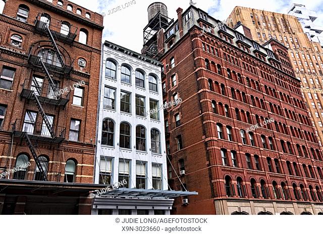 New York City, Manhattan, Tribeca. Looking up at Cast Iron Buildings on Duane Street
