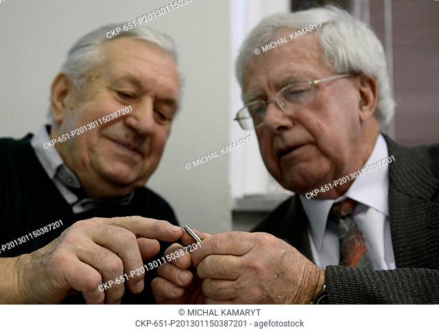 Miroslav Seba left and Lubomir Navratil are looking at a new pacemaker during a press conference about the implantation of pacemakers in collaboration with...