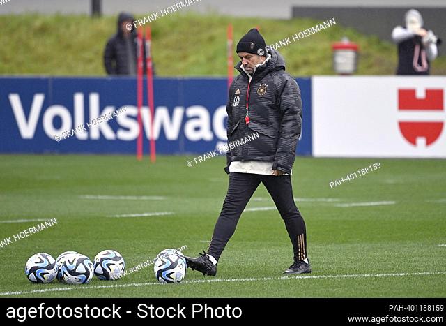 Federal coach Hans Dieter Hansi FLICK (GER), looks pensively at balls, single image, cut out, full body shot, whole figure