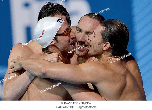Camille Lacourt (L), Jeremy Stravius (2-R) Giacomo Perez D'ortona (R) and Fabien Gilot (2-L) of France celebrate after winning the men's 4x100m Medley relay...