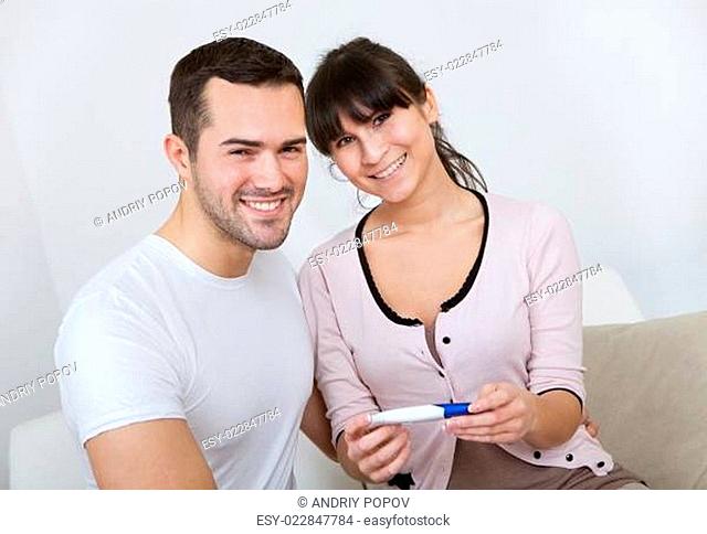 Couple finding out results of pregnancy test