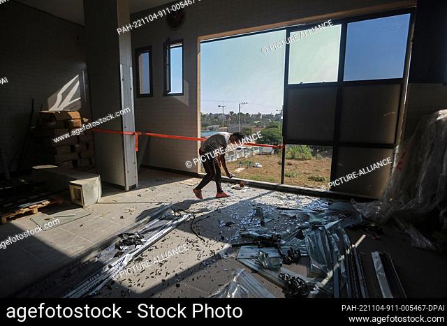 04 November 2022, Palestinian Territories, Maghazi: A Palestinian inspects the damage caused by an Israeli air strike in the early morning on the Maghazi...