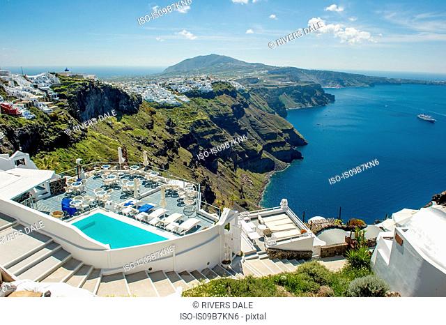View of hotel's pool and sea, Oia, Santorini, Greece