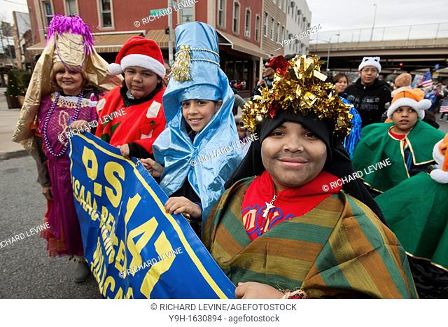 Paraders march in the annual Three Kings Day Parade in the Bushwick neighborhood of Brooklyn on Sunday, January 8, 2012 Neighborhood school children marched...