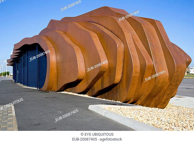 The rusted metal structure of the fish and seafood restaurant the East Beach Cafe designed by Thomas Heatherwick on the promenade