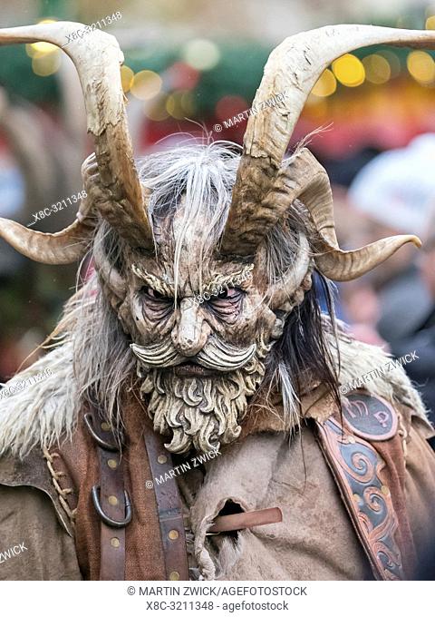Krampuslauf or Perchtenlauf during advent in Munich, an old alpine tradition taking place during christmas time in Bavaria, Austria and South Tyrol