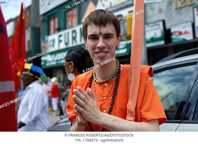 Hundreds of members of the Hare Krishna religion march in Richmond Hill in the New York borough of Queens during their annual Ratha Yatra parade The...