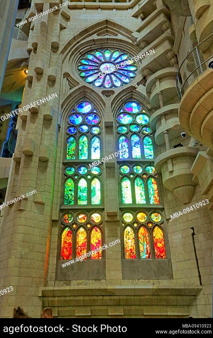 Stained glass window inside the Sagrada Familia cathedral by Antoni Gaudi in Barcelona, Catalonia, Spain