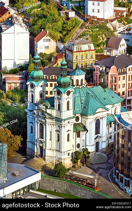 Roman Catholic Cathedral of St. Mary Magdalene is located in the very heart of the Karlovy Vary spa area., Czech republic. View from hill