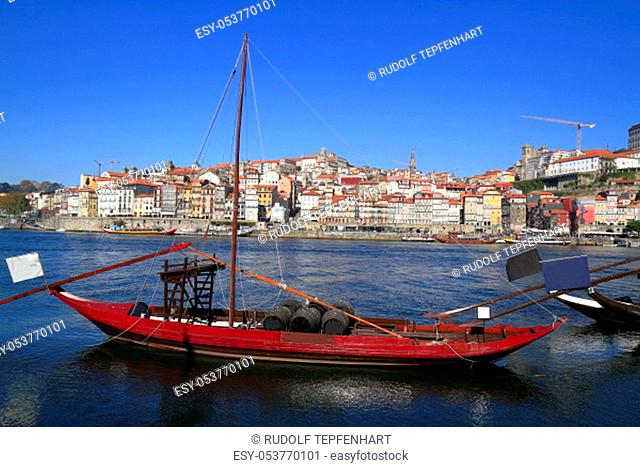 Traditional rabelo boats, Porto city skyline, Douro river and and Dom Luis or Luiz iron bridge. Porto, PÜortugal, Europe
