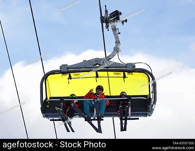 RUSSIA, SOCHI - DECEMBER 8, 2023: Skiers ride a chairlift at the Rosa Khutor mountain resort. Dmitry Feoktistov/TASS
