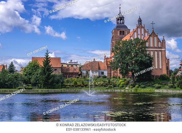 Gothic Church of Saint Anne and Saint Stephen over so called Prison Pond on Pisa River in Barczewo town, Warmian-Masurian Voivodeship of Poland