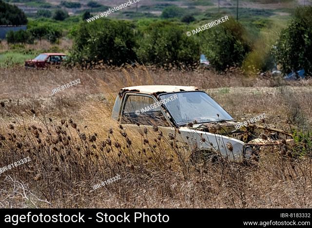 Abandoned car in the desert. Rhodes, Greece, Europe