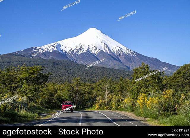 Car on the road to Osorno Volcano, Vicente Perez Rosales National Park, Region de los Lagos, Chile, South America