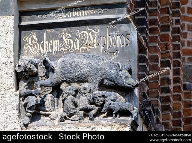 17 April 2023, Saxony-Anhalt, Lutherstadt Wittenberg: An invective sculpture known as the ""Judensau"" can be seen at the town church