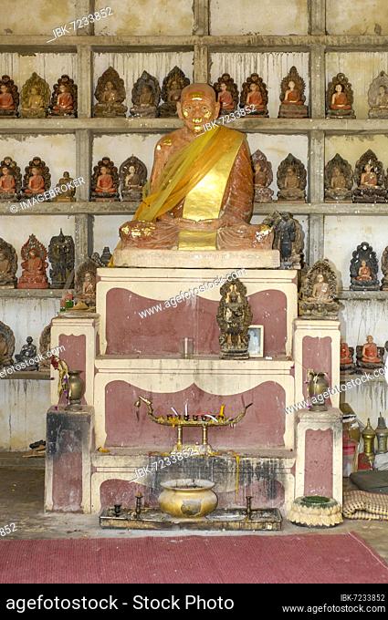 Historic old statue of Buddhist monk in Buddhist monastery, Koh Lanta Island, Krabi Province, Thailand, Asia