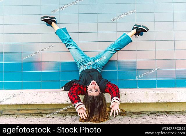 Portrait of teenage girl having fun outdoors