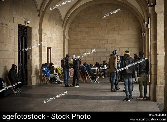Some African migrants sheltered from the cold under the arches of Irun City Council. Irun (Basque Country). October 28, 2018