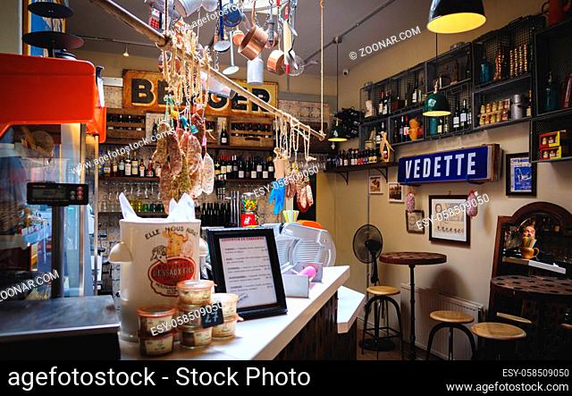 interior of a bar with lots of vintage products in the city of bath england somerset uk