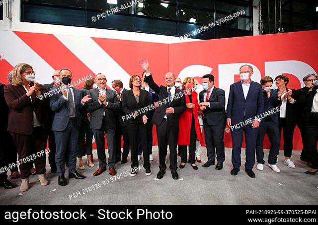26 September 2021, Berlin: Olaf Scholz (M), Finance Minister and SPD candidate for Chancellor, waves during the election party at Willy Brandt House