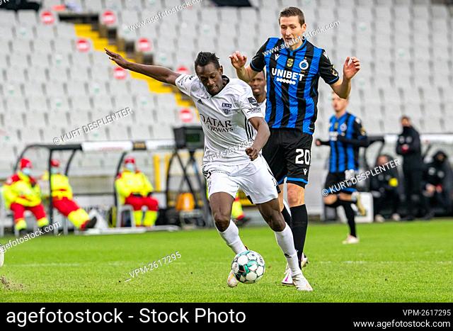 Eupen's Amara Baby and Club's Hans Vanaken fight for the ball during a soccer match between Club Brugge KV and KAS Eupen, Saturday 26 December 2020 in Brugge
