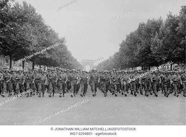 FRANCE Paris -- 29 Aug 1944 -- American troops of the US Army 28th Infantry Division march down the Champs Elysees, Paris