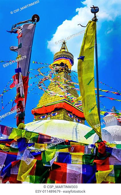 Bouddhanath stupa and buddhist flags