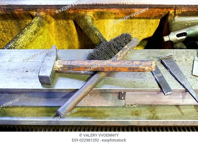 hammer and metal brush on boring machine