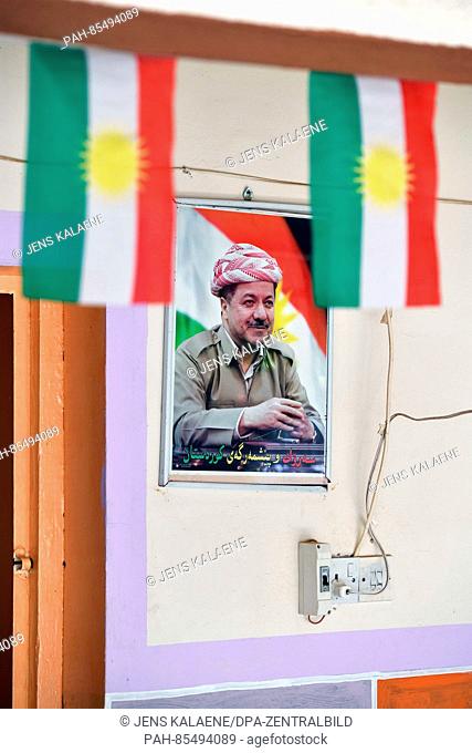 A photo of Massud Barsani, president of the autonomous Kurdish region in northern Iraq, displayed on a school building in Erbil, Iraq, 20 October 2016