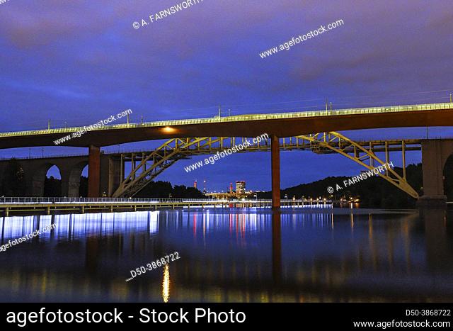 Stockholm, Sweden A view at night of Arsta train and pedestrians bridge