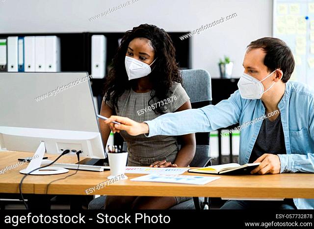 Office Business Employee Using Face Mask And Social Distancing