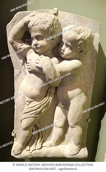 drunken boys honour Bacchus the Roman god of wine; Roman marble sarcophagus (detail) 150 AD