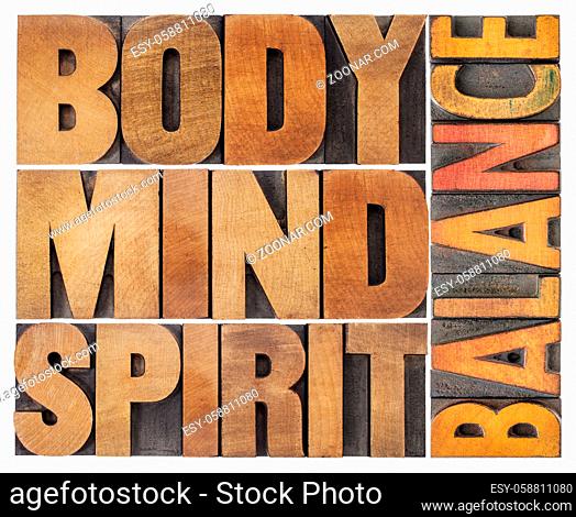 body, mind and spirit balance - a collage of isolated text in vintage wood letterpress printing blocks, holistic approach to wellbeing and lifestyle concept
