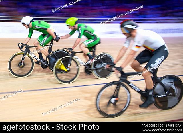 01 March 2020, Berlin: Cycling/Track: World Championship, Madison, Men: The team from Ireland, Mark Downey and Felix English, performs a slingshot