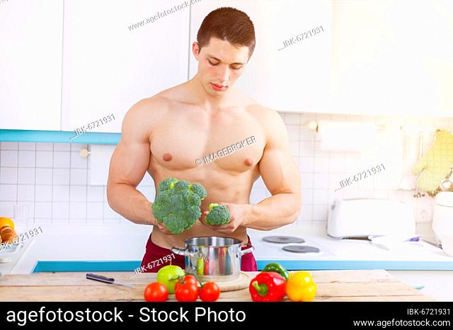Cooking food vegetable bodybuilder man lunch text free space healthy nutrition copyspace in germany