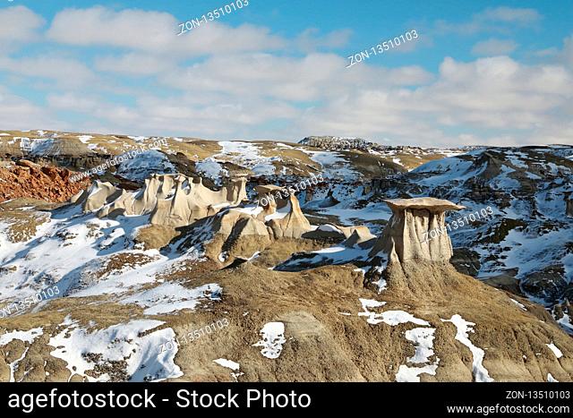 Bisti Badlands Wilderness Area in winter with snow, New Mexico, USA
