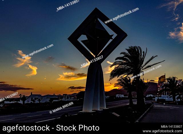 wind chimes in front of the fundacion cesar manrique at sunset, sculpture by césar manrique, spanish artist from lanzarote, 1919-1992, lanzarote, canaries