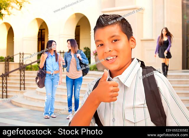 Young Male Hispanic Student Boy with Thumbs Up on Campus
