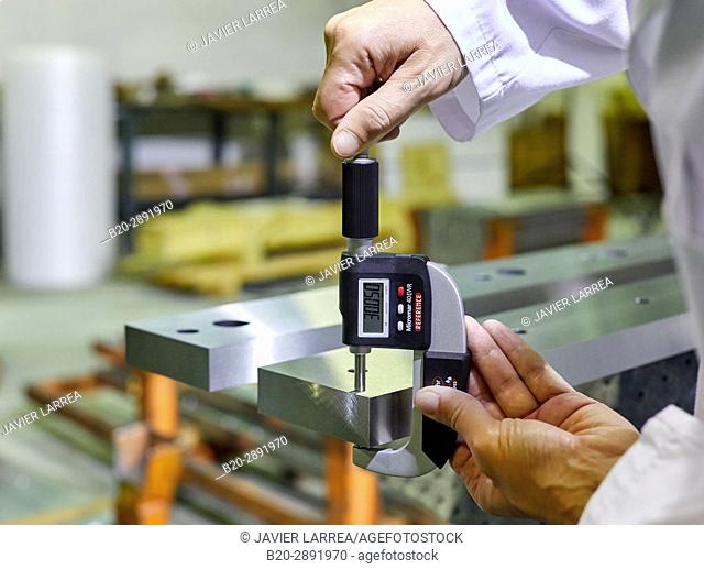 Quality control technician, Checking the measurement with micrometer, Mechanical industry, Gipuzkoa, Basque Country, Spain, Europe