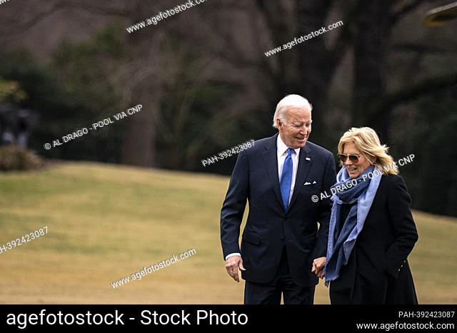 United States President Joe Biden and first lady Dr. Jill Biden walk on the South Lawn of the White House in Washington, DC, US, on Monday, January 23, 2023